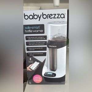 Brand new never used or opened Baby Breda bottle warmer